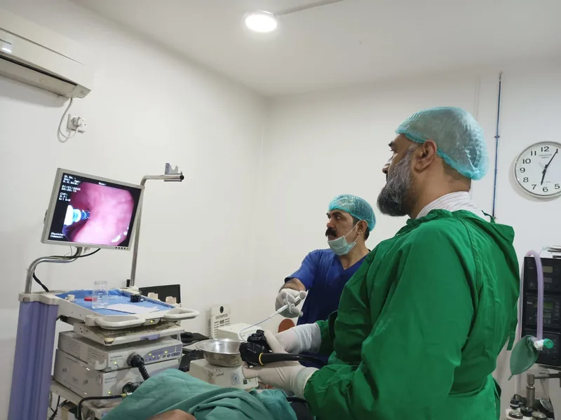 Dr Ali Taj performing a diagnostic colonoscopy using a digital scope